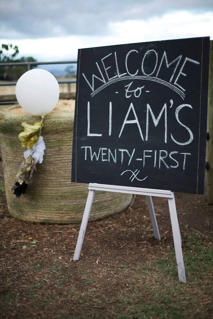 a chalkboard sign with the words welcome to llama's twenty - first written on it