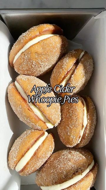 a box filled with donuts covered in icing