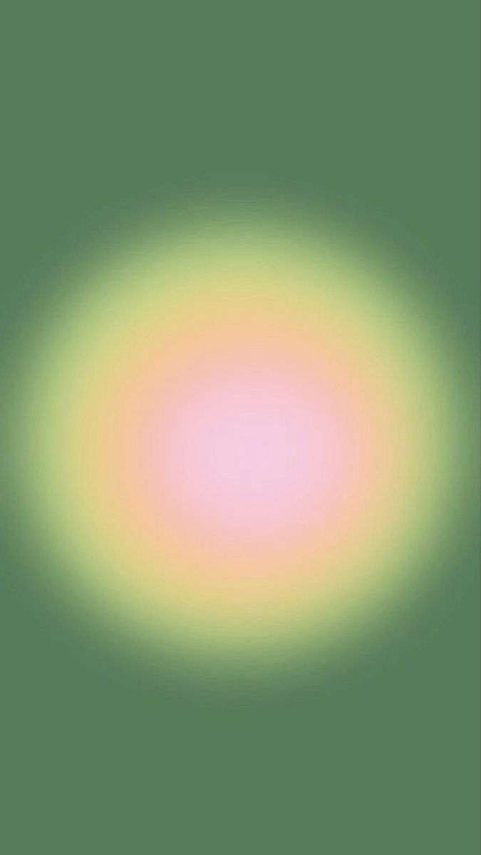 an image of a green and yellow light in the middle of the night time sky