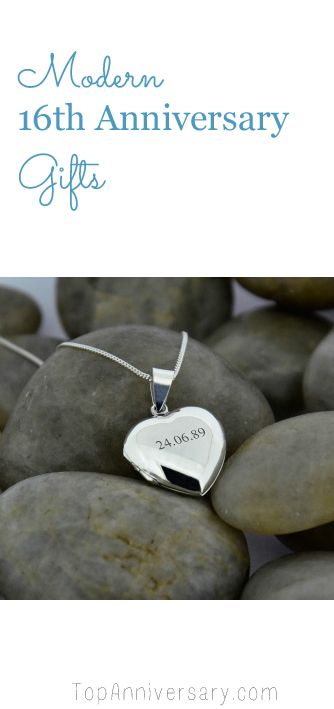 a heart shaped pendant sitting on top of rocks with the words modern 16th anniversary gifts