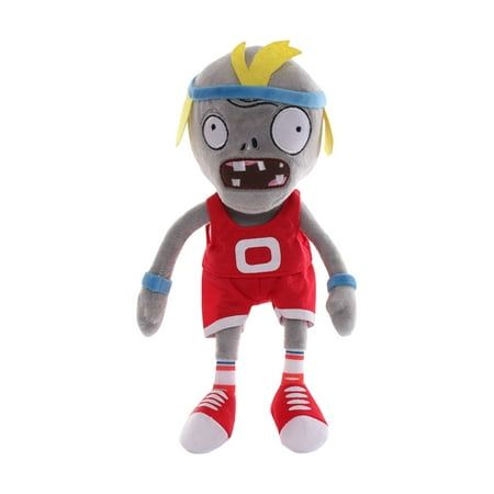 a stuffed toy that looks like it is wearing a red shirt and shorts with a yellow headband