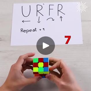 someone is holding a rubik cube in front of a sign that says urfer repeat