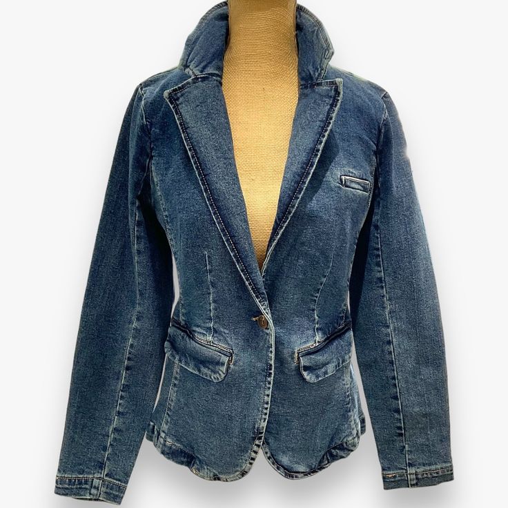 Denim blazer jacket, long sleeve with button closures, seams & center back vent, flap pockets & darts for shape support. Dark wash denim on standard fit. Body length from HPS: 26", Sleeve length: 24", Bust: 36" (Size Small) 99% COTTON 1% SPANDEX Machine wash cold, Tumble dry low. Classic Long Sleeve Denim Jacket With Double Button Closure, Classic Single Breasted Denim Blazer, Classic Denim Jacket With Notch Lapel And Pockets, Classic Long Sleeve Denim Blue Blazer, Classic Denim Button-up Blazer, Classic Medium Wash Blazer With Button Closure, Denim Blazer With Patch Pockets And Long Sleeves, Denim Blazer With Patch Pockets And Notch Lapel, Classic Long Sleeve Denim Blazer