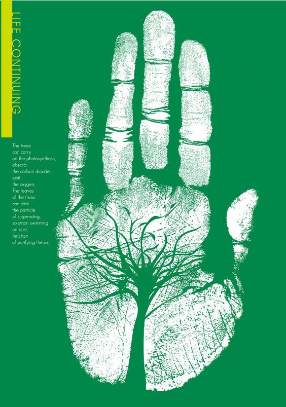 a green poster with an image of a tree in the palm of a human hand