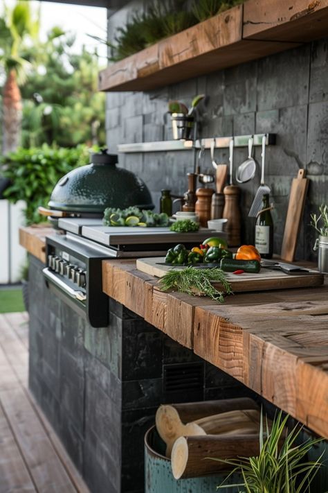 an outdoor kitchen with lots of cooking utensils