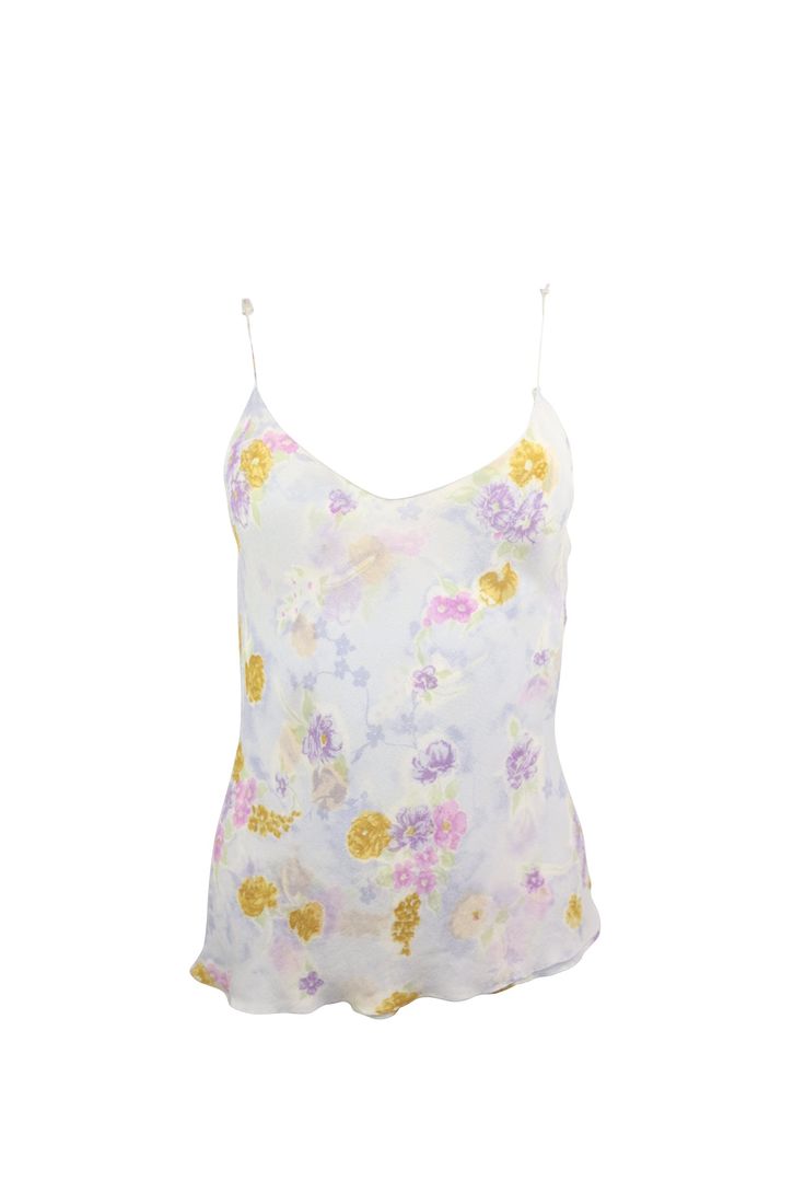 This top has a sweetheart neck, and a gorgeous floral design. It's perfect for a spring party or event, or a lovely day in summer. Pairing this piece with jeans and white sneakers would create a beautiful outfit, or even pairing with bright colors like yellow could as well. Recycled by Meskita My Closet. Size: M Elegant Yellow Top With Floral Print, Elegant Yellow Tops With Floral Print, Elegant Floral Print Tops For Garden Party, Spring Sleeveless Floral Print Tops, Floral Print Sleeveless Tops For Spring, Sleeveless Floral Print Tops For Spring, Spring Printed Cami Tops, Printed Cami Tops For Spring, Feminine White Top For Garden Party