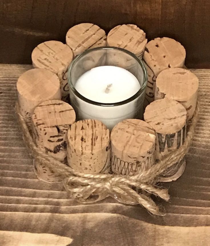 a candle and some cookies on a table