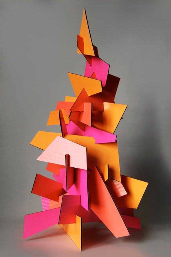 an abstract sculpture made out of colored paper