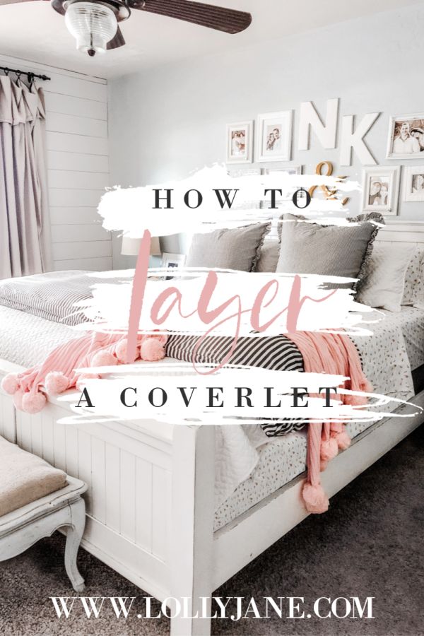 a white bed with pink and gray pillows on it, the text how to lace a coverlet