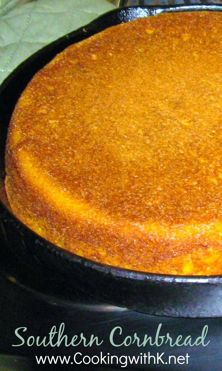 a round cake sitting on top of a black pan