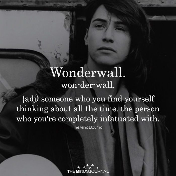 a black and white photo with the words wonderwall on it, along with an image of a man holding a guitar