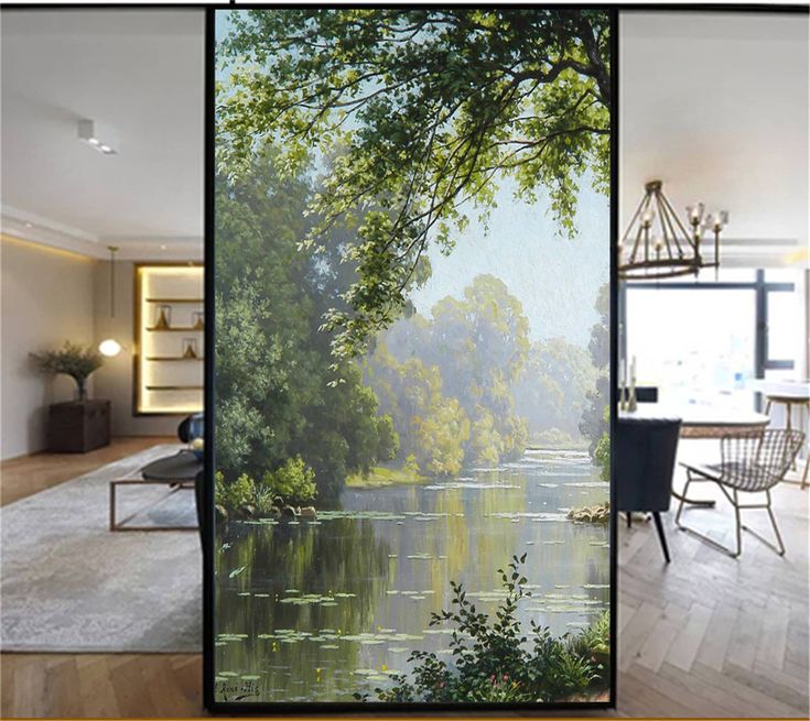 three pictures of the inside of a house, one with trees and water in it