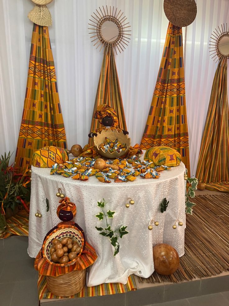 a table covered with lots of food and decorations