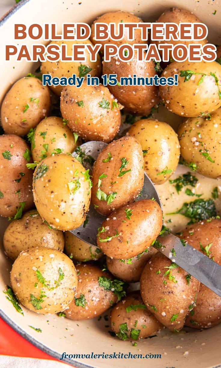 a pot filled with potatoes covered in parsley