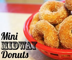 a red bowl filled with sugar covered donuts