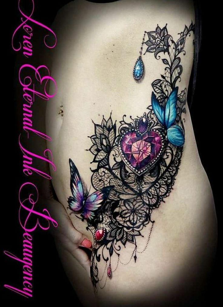 a woman's stomach with butterflies on it and the words, love is in the air