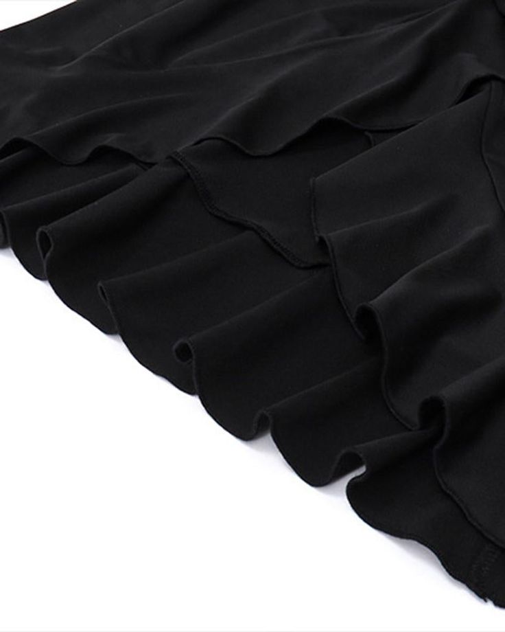 Details: Low-waist maxi skirt with front ruffle designSkirt Length: LongMaterials:95% Polyester + 5% Spandex Fitted Black Skirt With Layered Hem, Chic Black Skirt With Layered Hem, Solid Color Stretch Mini Skirt With Ruffles, Chic Long Skirt Bottoms With Ruffles, High Waist Stretch Ruffled Skirt, Black Bottoms With Layered Hem For Summer, Ruffled Midi Skirt For Party, Spring Night Out Ruffled Maxi Skirt, High Waist Ruffled Maxi Skirt