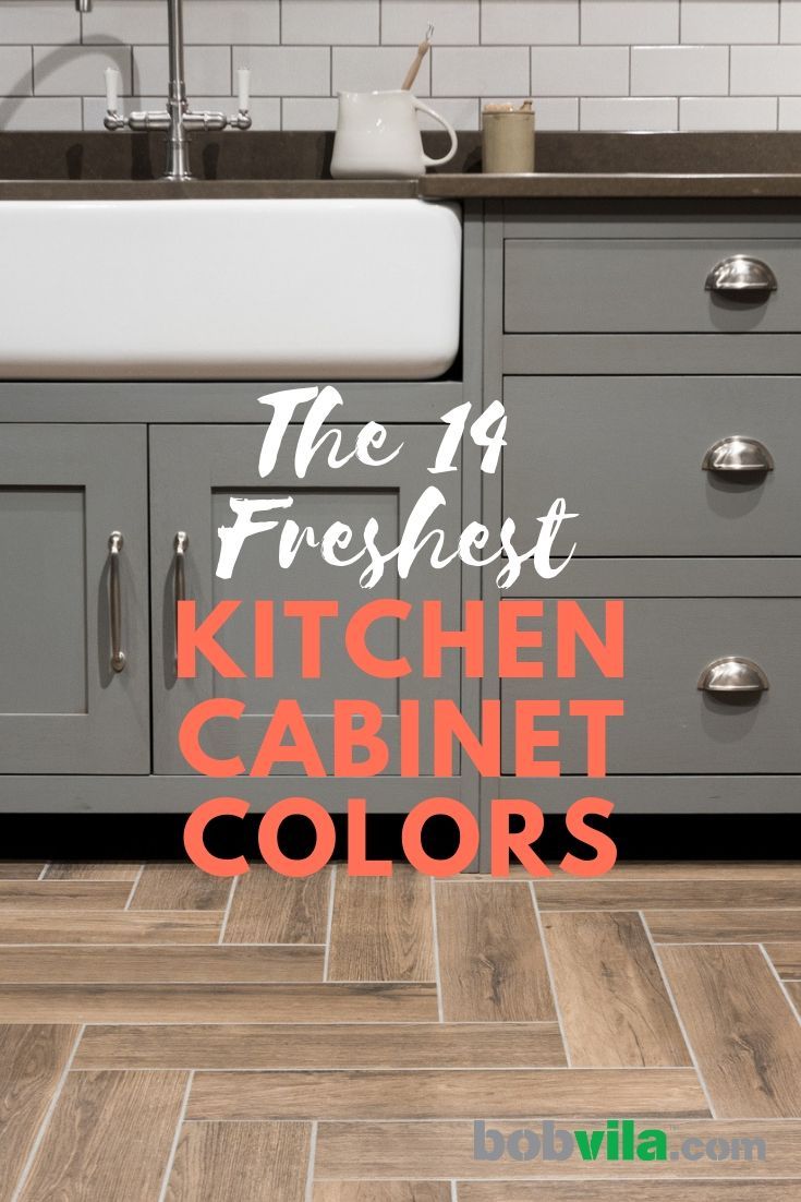 the kitchen cabinets are painted in gray and orange