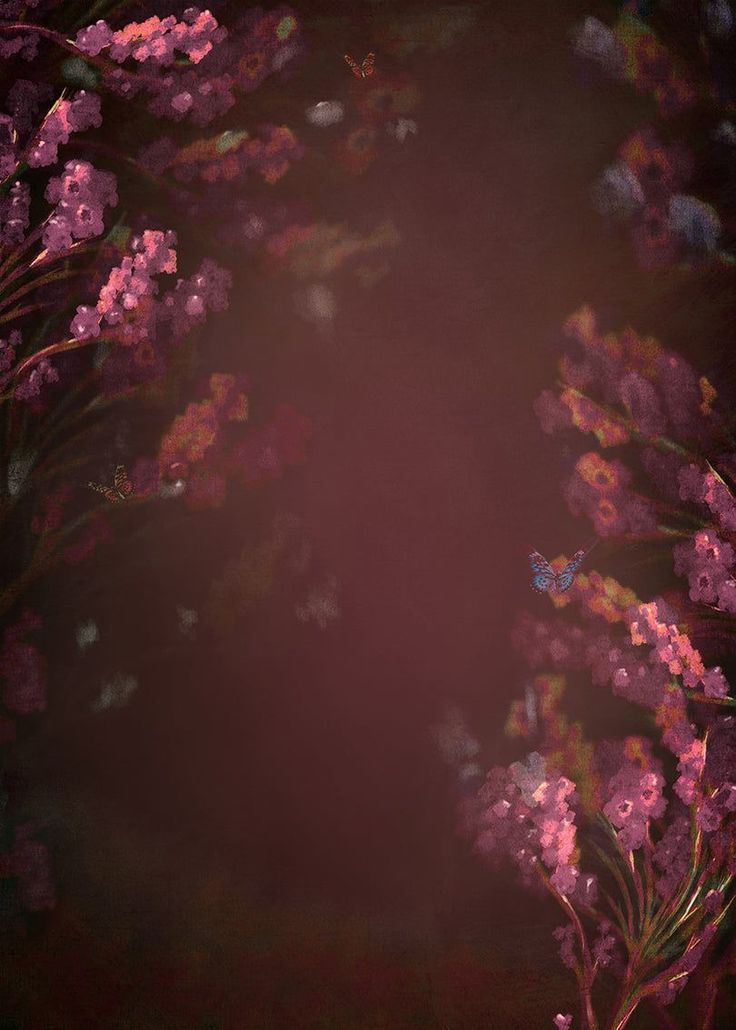 purple flowers are in the foreground with a dark background