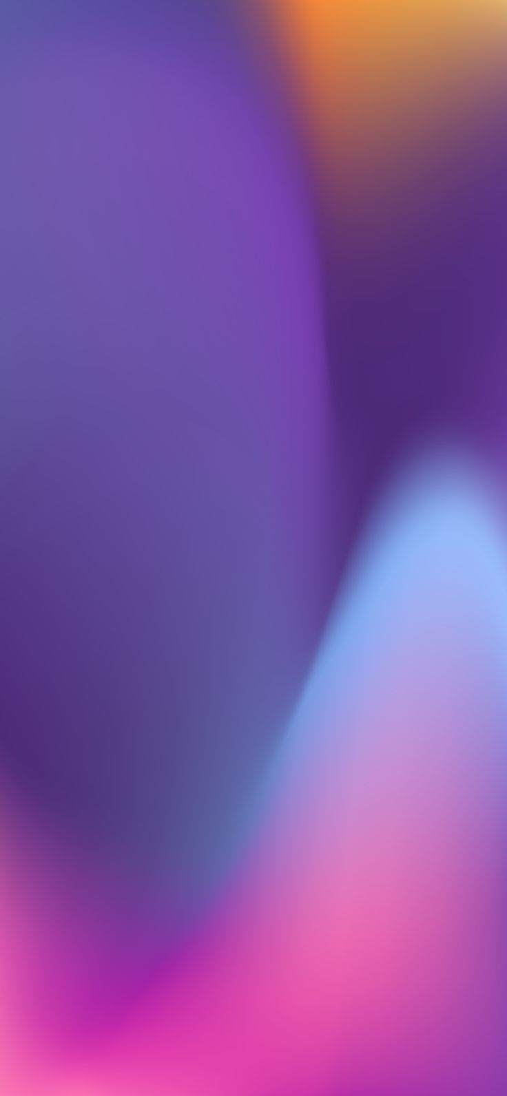 an abstract blurry background in purple, yellow and orange colors with some soft highlights