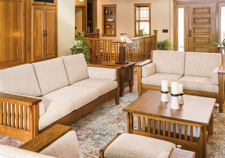 a living room filled with furniture and lots of wood