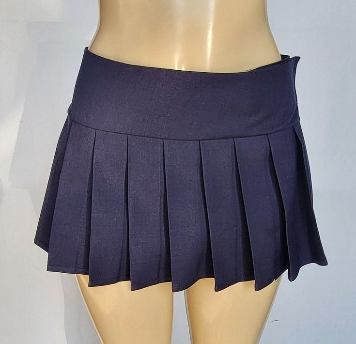 "JUNIOR to PLUS SIZE \"Navy\" PLAID MICRO MINI SKIRT 10\"-13\" LONG. (Navy) TO ENSURE YOU ORDER THE CORRECT SIZE SKIRT, PLEASE READ THIS CAREFULLY; THEN MATCH IT WITH SIZES. ALL OUR SKIRTS ARE ALWAYS MADE WITH A 3\" LONG WAITSBAND + THE LEGNTH OF THE SKIRT. OUR SKIRTS ARE ALL MADE TO ORDER AND THE LENGTH MAY SLIGHTLY CHANGE A FEW CENTIMETERS, BUT WE TRY TO BE AS ACCURATE AS POSSIBLE.  BELOW IF THE FINAL LENGTH OF THE SKIRT.  *XSMALL - Waistband measures 28\" around when fully closed. Skirt is 10 Navy Skort For School, Fitted Blue Mini Skirt For School Uniform, Navy Fitted Skort For School, Casual Fitted Navy Skort, Blue Fitted Mini Skirt For School Uniform, Navy Fitted Skirt For School, Navy Fitted Short Length Skort, Navy Fitted Tennis Skirt, Blue Fitted Mini Pleated Skirt