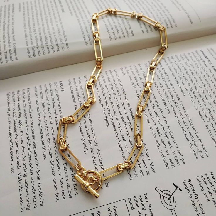 "A beautiful and unique gold plated chain necklace with a toggle clasp. With unique conection between the links! Easy to match, this necklace will upgrade any outfit! Wear it with a plain white t-shirt and jeans in the morning or with a small black dress on the evening. Find out which way you like it the best. Available in silver plating as well. Materials: 24 k gold plated brass chain and elements - shiny finish Silver plated brass chain and elements - oxidized finish Measurements: Chain width: Chic Toggle Necklace With Paperclip Chain For Everyday, Chic Everyday Toggle Necklace With Paperclip Chain, Gold Toggle Necklace With Paperclip Chain, Chic Gold Toggle Necklace With Paperclip Chain, Gold Chic Toggle Necklace With Paperclip Chain, Chic Link Chain Necklace With Toggle Clasp, Chic Toggle Link Necklace With Chain, Minimalist Paperclip Chain Necklace With Toggle Clasp, Trendy Link Toggle Necklace With Adjustable Chain