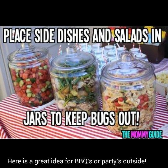 jars filled with food sitting on top of a table