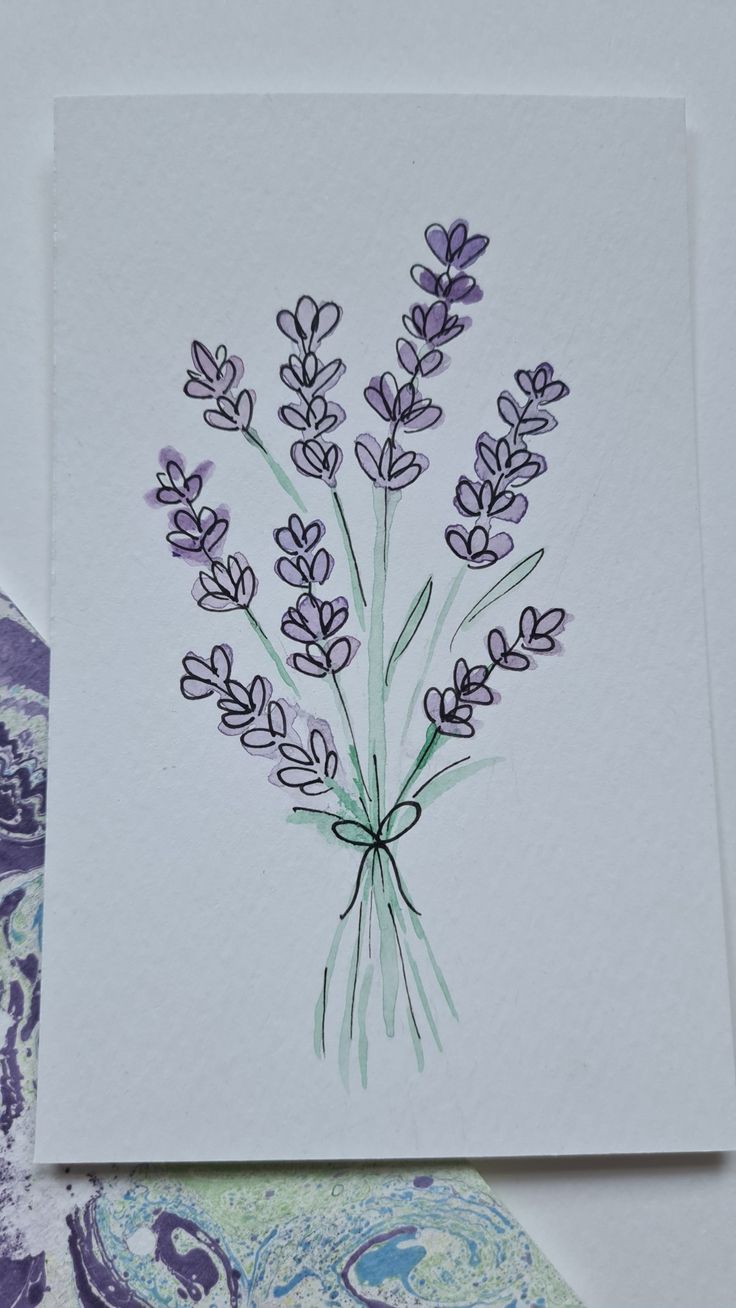 a drawing of lavender flowers on white paper