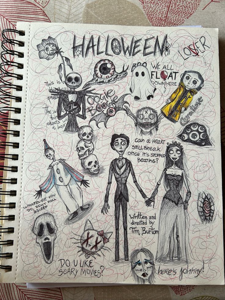 a notebook with some drawings on it and writing in the pages that says halloween is flat