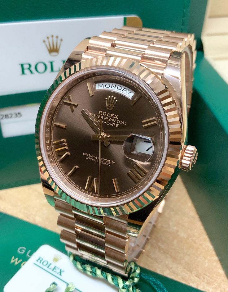 Rolex Day-Date 40 228235 Rose Gold Gold Rolex, In Between, Rolex Day Date, Roman Numeral, 3 O Clock, Gold Price, Roman Numerals, O Clock, Rolex