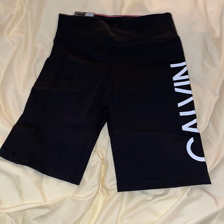 Calvin Klein Biker Shorts Size Small Brand New Casual Black Knee-length Activewear Shorts, Black Knee-length Biker Shorts For Athleisure, Casual Black Biker Shorts, Black Athleisure Biker Shorts Above Knee, Casual Above Knee Biker Shorts For Gym, Casual Black Knee-length Shorts Activewear, Trendy Black Sports Shorts, Sporty Black High-waisted Biker Shorts, Trendy Black Athletic Shorts For Workout