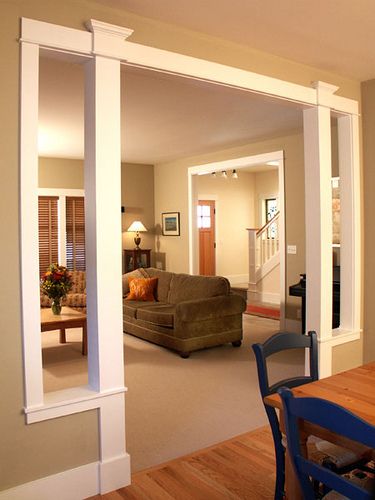 an open living room and dining room area