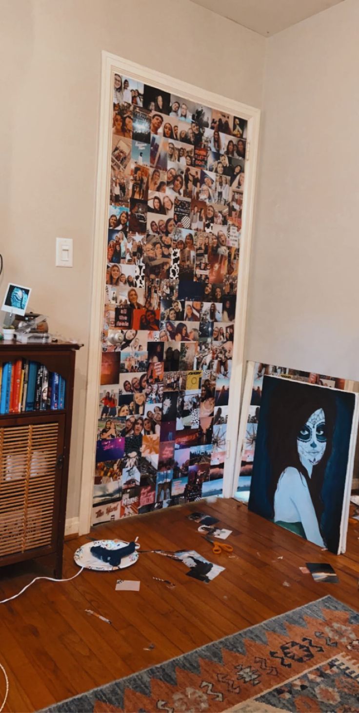 a living room filled with furniture and lots of pictures on the wall next to a tv