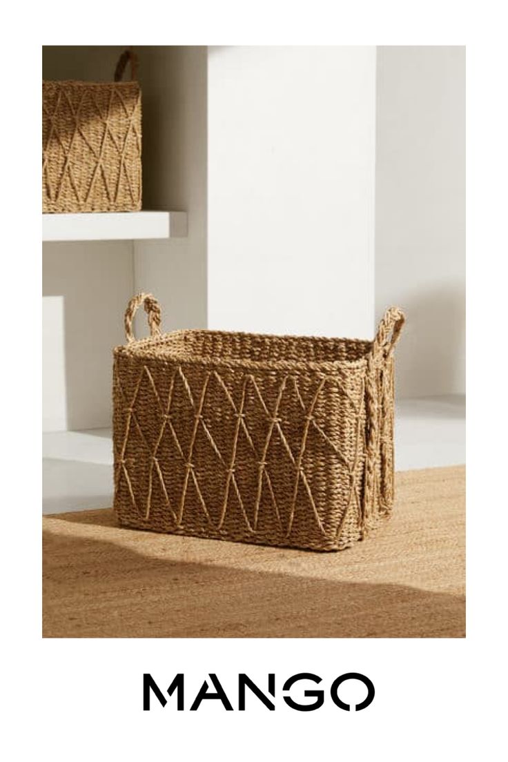 a basket sitting on top of a wooden floor next to a shelf with two baskets