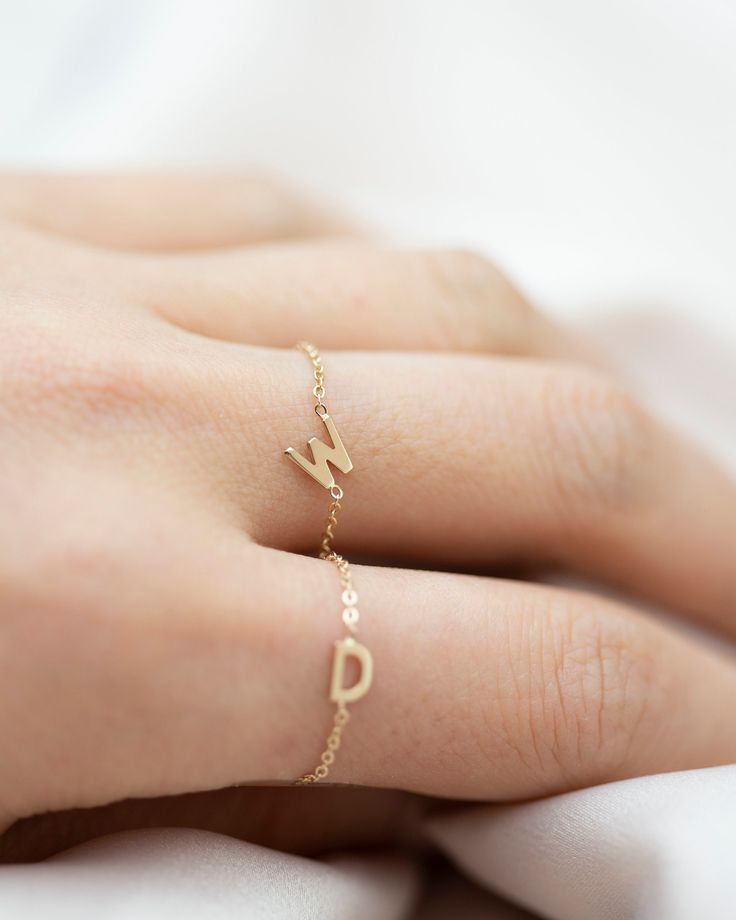 Dainty 14K Initial Letter Ring: Barely there ring in 14k Gold with a small block Letter Modern and timeless Super Dainty Link Chain Ring Simple, minimalist everyday Alphabet Initial Ring - Perfect as a stacking ring or by itself. Each initial measures approx. 4.8mm Available in 14K Yellow Gold or 14K White Gold SIZE: US4.5 - 10 Letter: A-Z or an heart charm * Leave us your initial in the comment box at checkout. # Personalized ring Statement rings meaningful gift mom ring chain ring initial chai 14k Gold Stackable Initial Promise Ring, Stackable Sterling Silver Initial Ring In Yellow Gold, Stackable 14k Gold Initial Promise Ring, Yellow Gold Sterling Silver Stackable Initial Ring, Yellow Gold Stackable Initial Ring In Sterling Silver, Stackable Initial Ring In Yellow Gold And Sterling Silver, Tiny Open Ring Jewelry In 14k Gold, Dainty Stackable Initial Ring With Open Design, Dainty Stackable Initial Open Ring