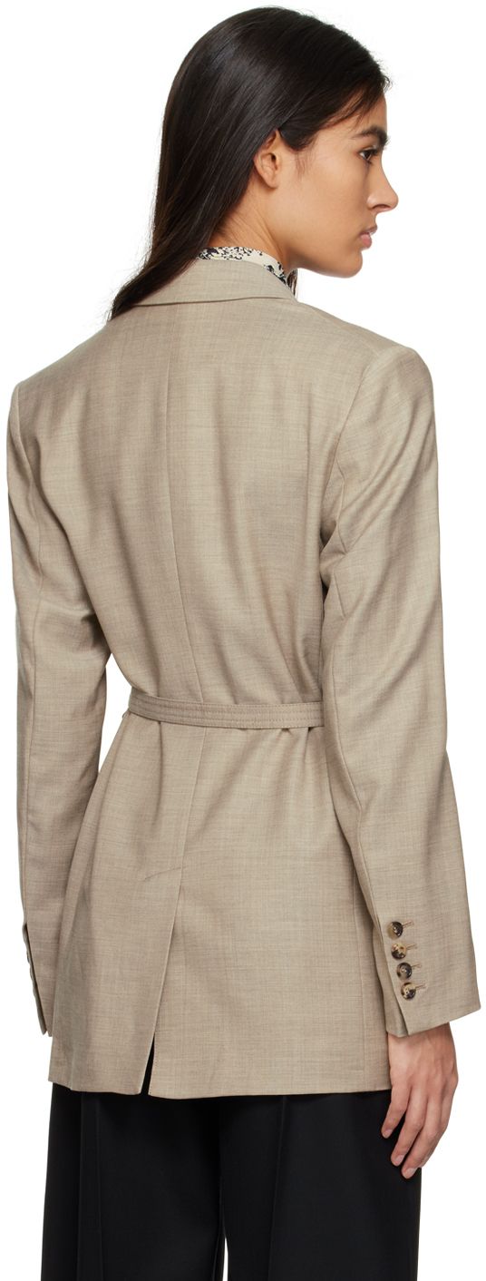 Wool twill blazer. · Wrap construction · Notched lapel · Self-tie closure · Welt pockets · Padded shoulders · Four-button surgeon's cuffs · Central vent at back hem · Full cupro satin lining Supplier color: Beige Office Blazer Dress With Long Sleeves And Pressed Crease, Long Sleeve Blazer Dress With Pressed Crease For Office, Long Sleeve Blazer Dress For Office With Pressed Crease, Classic Business Blazer With Belted Cuffs, Long Sleeve Blazer Dress With Pressed Crease For Work, Tailored Blazer With Belted Cuffs And Lapel Collar, Classic Fitted Blazer With Belted Cuffs, Classic Tailored Blazer With Belted Cuffs, Tailored Office Blazer With Belted Cuffs