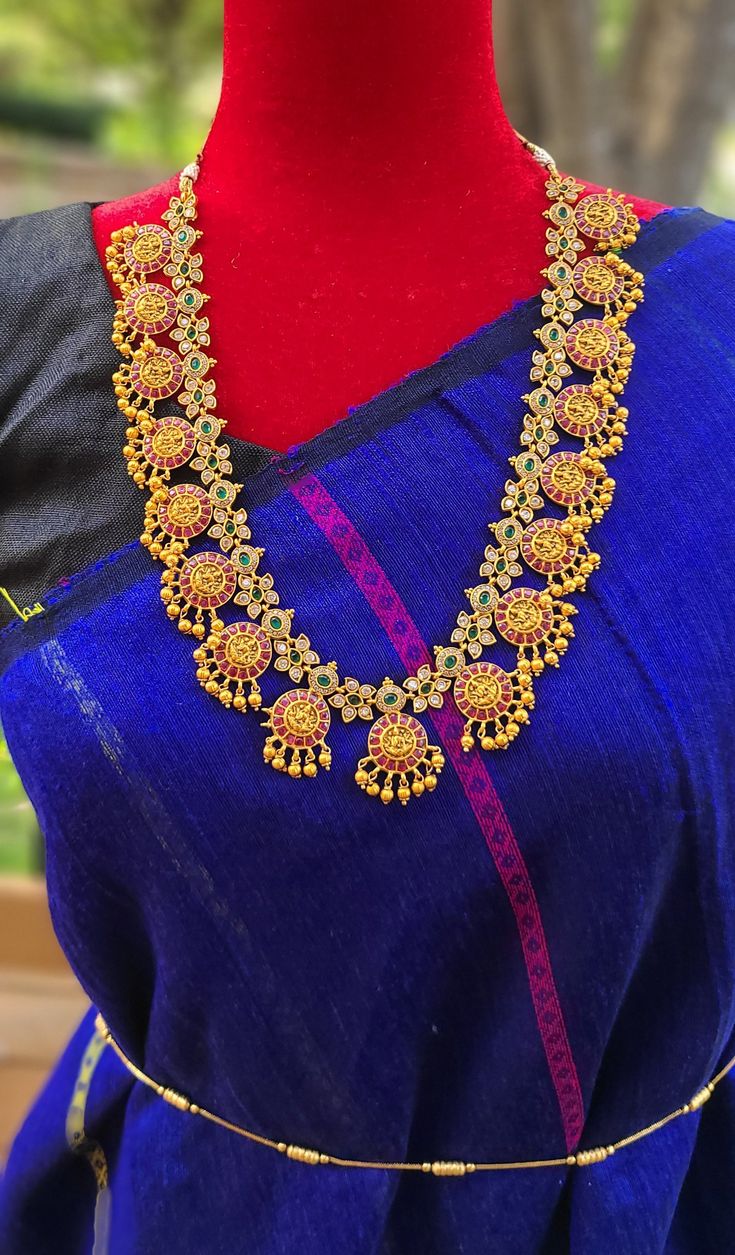 Add charm and charisma to your beautiful personality with these beautifully designed and handcrafted Brass necklaces. The antique finish gives this Necklace a very eye-catching look. A choker is also designed beautifully and compliments the Necklace very well. Wear it with any of your party or casual outfits and grab compliments all the way! Bollywood Style Long Temple Necklace For Celebrations, Long Temple Necklace With Latkans For Celebrations, Traditional Long Temple Necklace With Latkans, Festive Antique Gold Temple Jewelry Bridal Necklace, Brass Temple Jewelry Necklace With Cutdana, Long Meenakari Temple Necklace For Festivals, Long Temple Necklace With Meenakari For Festivals, Antique Gold Necklace For Diwali Festive Season, Festive Antique Gold Necklaces For Diwali