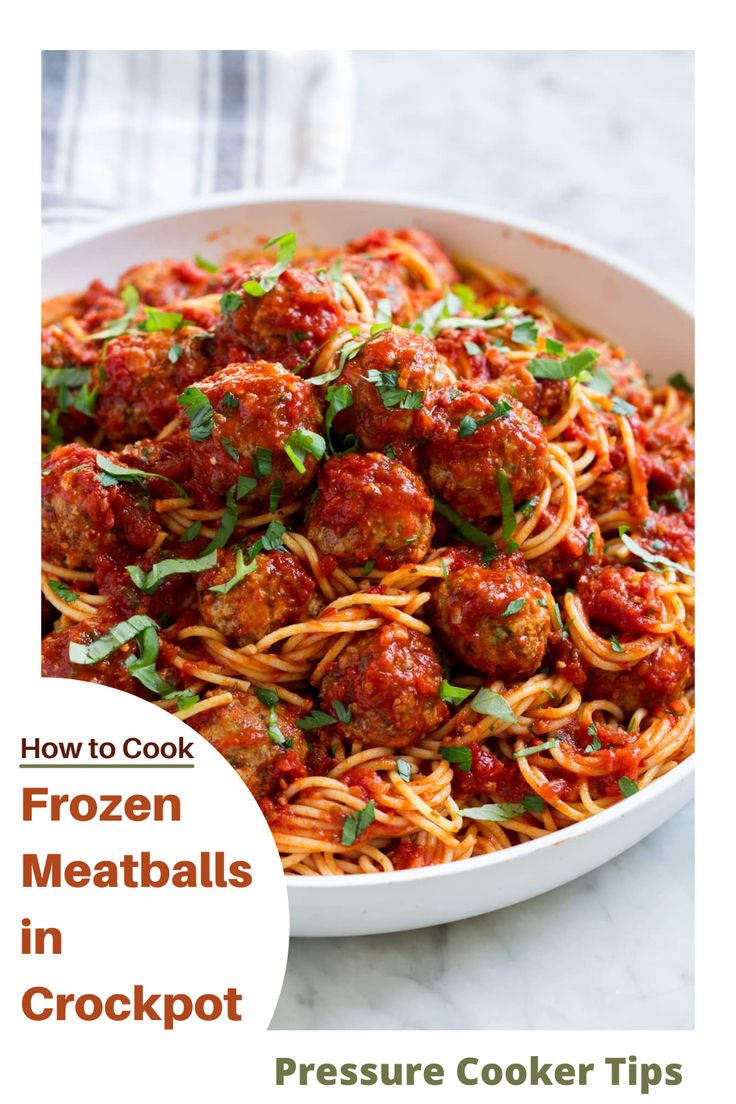 the best meatballs recipe with spaghetti and parsley in a white bowl on a marble countertop