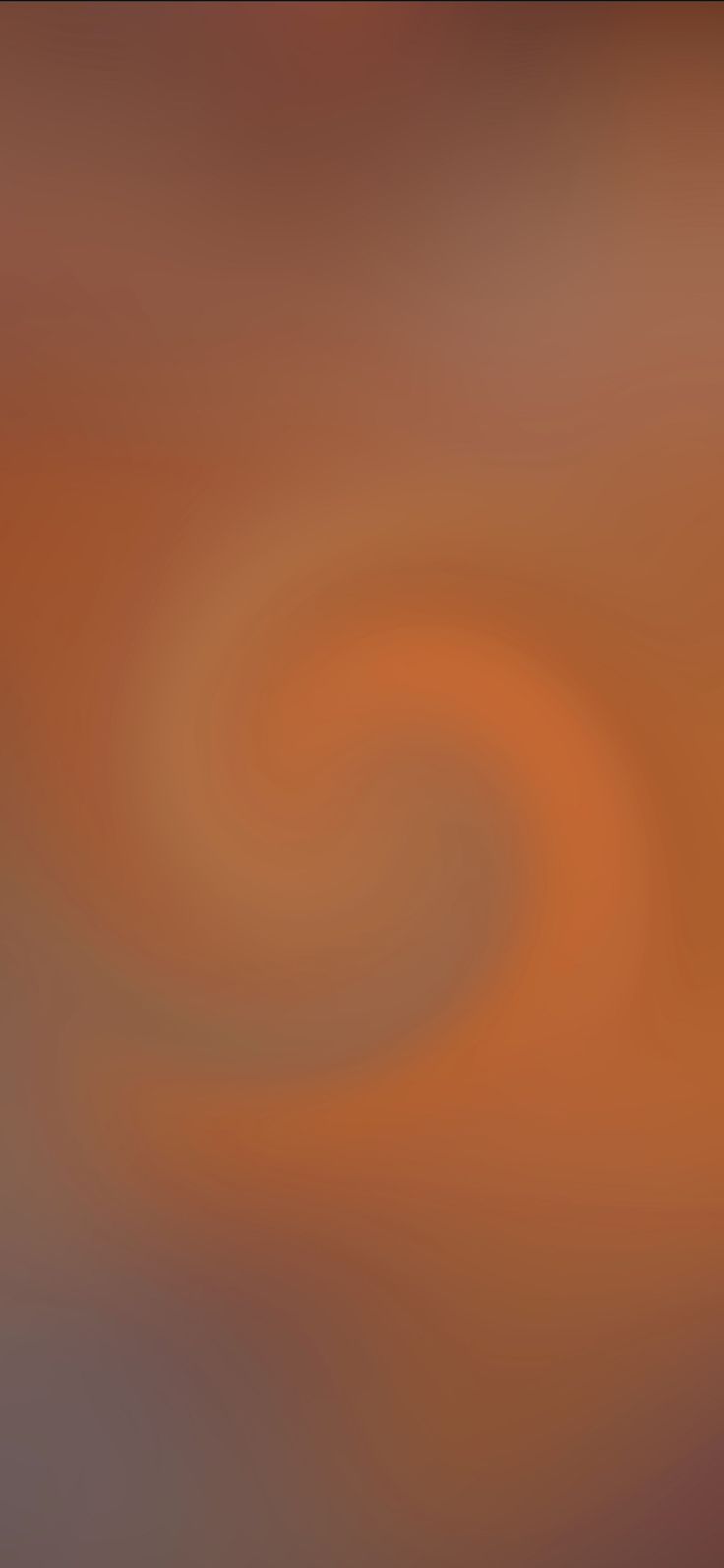 blurry image of an orange and brown swirl