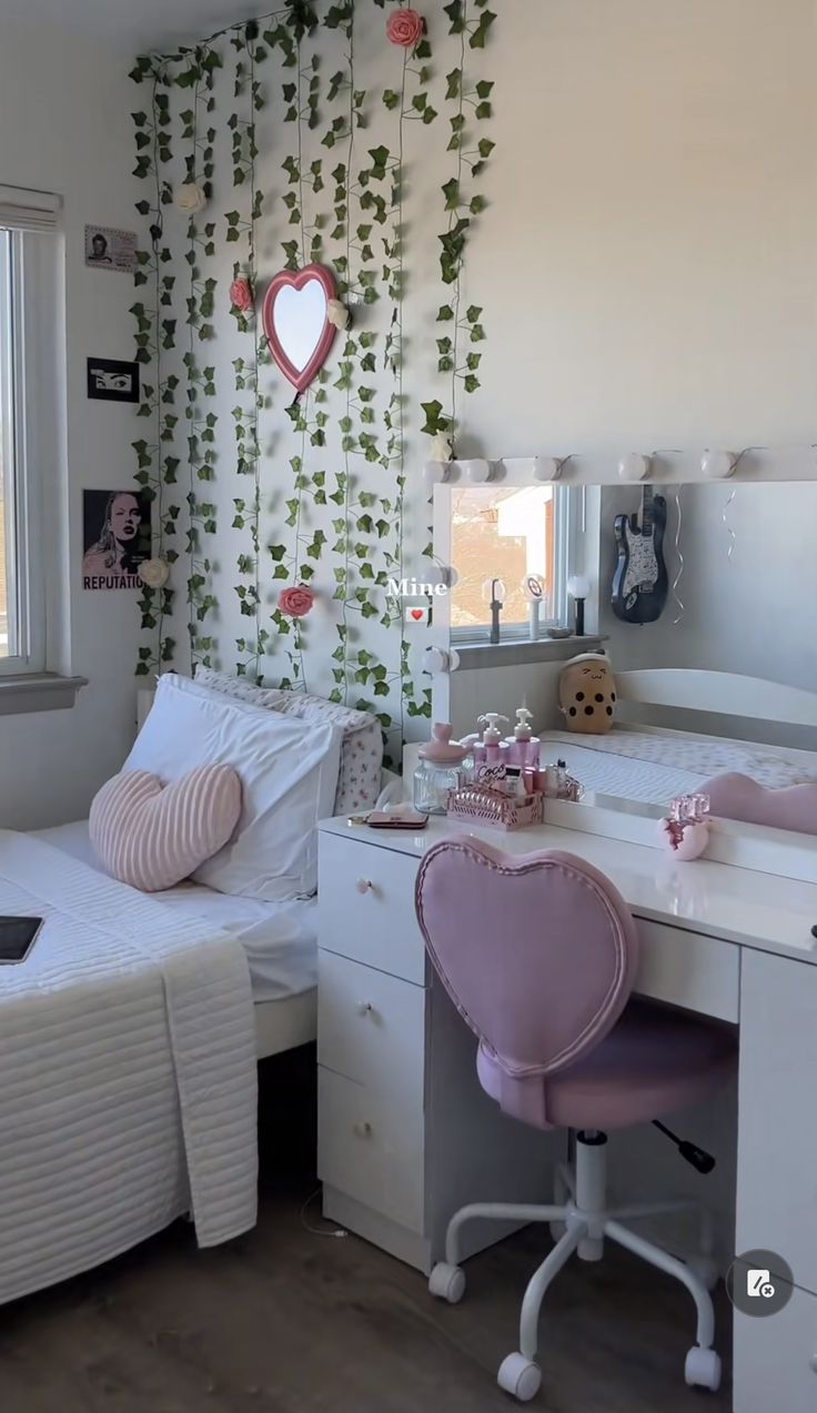 a bedroom with two beds and a desk in front of a window that has ivy growing on the wall