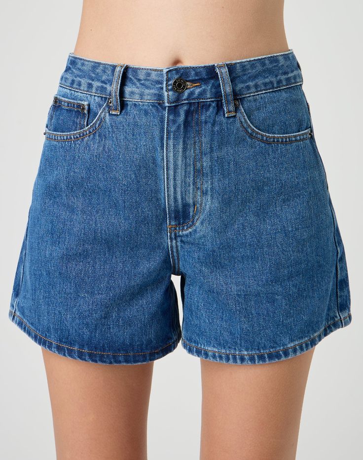 These denim shorts feature a high rise waist, a line style, belt loops and pockets. Jean Shorts With Belt Loops For Summer, High Waist Cotton Jean Shorts With Belt Loops, High-waist Cotton Jean Shorts With Belt Loops, Trendy Cutoff Shorts With Belt Loops, Denim Shorts With Belt Loops, High Rise Denim Shorts With Belt Loops, Trendy High-waisted Jean Shorts With Belt Loops, Trendy Short Jean Shorts With Belt Loops, Mid-rise Denim Shorts With Belt Loops