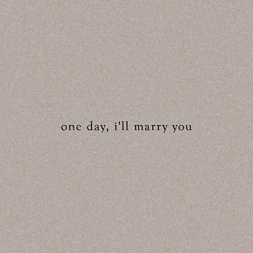 the words one day, i'll marry you written in black on a gray background