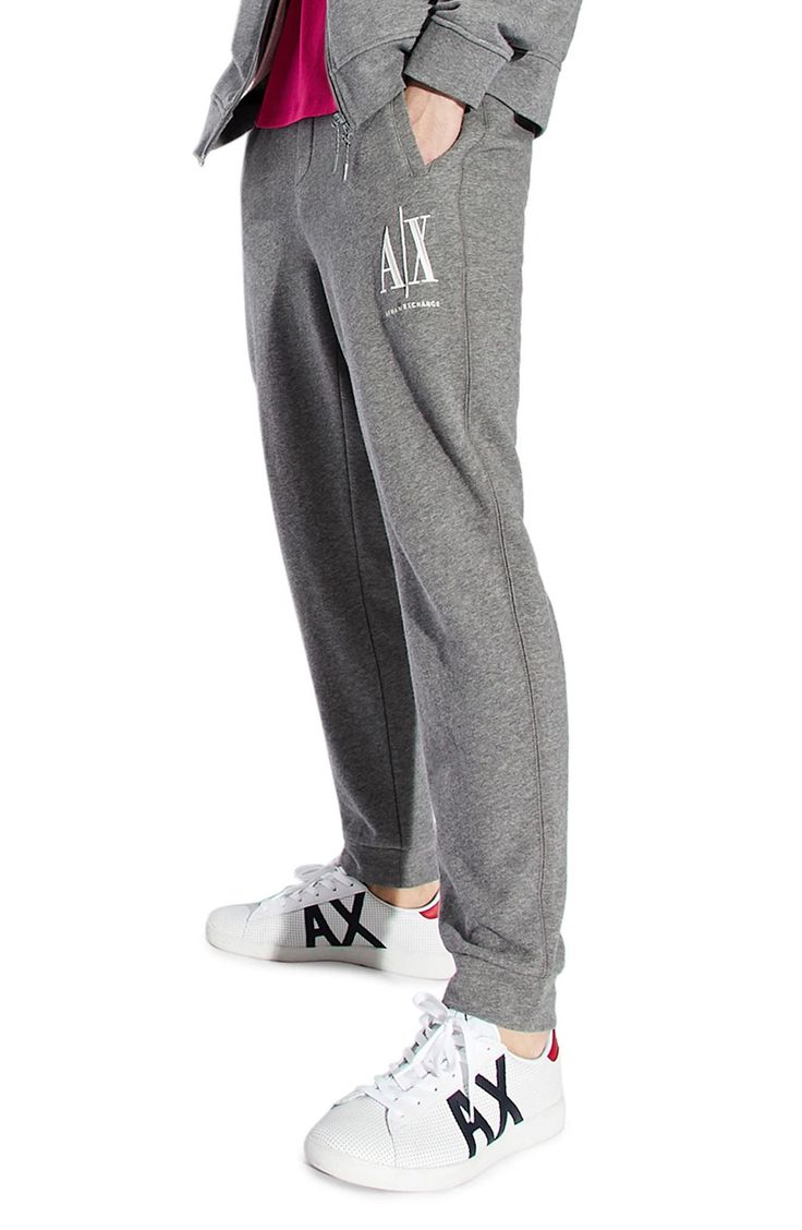 Dimensional Armani Exchange embroidery tops one leg of sweatpants knit from soft, breathable cotton in a fit that stays close for easy-moving comfort. Elastic waist with internal drawcord Front welt pockets; back welt pocket Banded cuffs 100% cotton Imported Men's Clothing Cotton Sweatpants With Logo Waistband For Sports, Logo Waistband Athleisure Sweatpants, Athleisure Sweatpants With Logo Waistband, Sporty Joggers With Logo Waistband For Streetwear, Casual Streetwear Sweatpants With Logo Waistband, Casual Sweatpants With Logo Waistband For Streetwear, Casual Sweatpants With Logo Waistband, Sporty Relaxed Fit Sweatpants With Logo Waistband, Casual Long Sweatpants With Logo Waistband