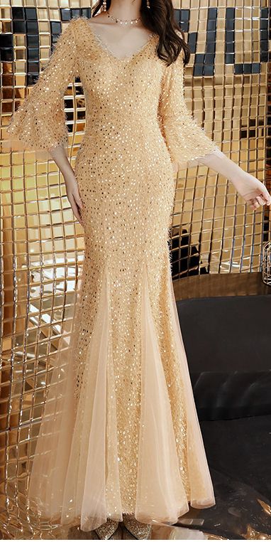 Gold Mermaid Dress For Prom, Gold Glamorous Mermaid Dress For Banquet, Glamorous Gold Mermaid Dress For Banquet, Gold Long Sleeve Evening Dress For Formal Occasions, Gold Mermaid Dress With Sweep Train, Gold Mermaid Dress With Sweep Train Floor-length, Gold Floor-length Mermaid Dress For Prom, Gold Floor-length Mermaid Dress With Sweep Train, Fishtail Gown For Party Season