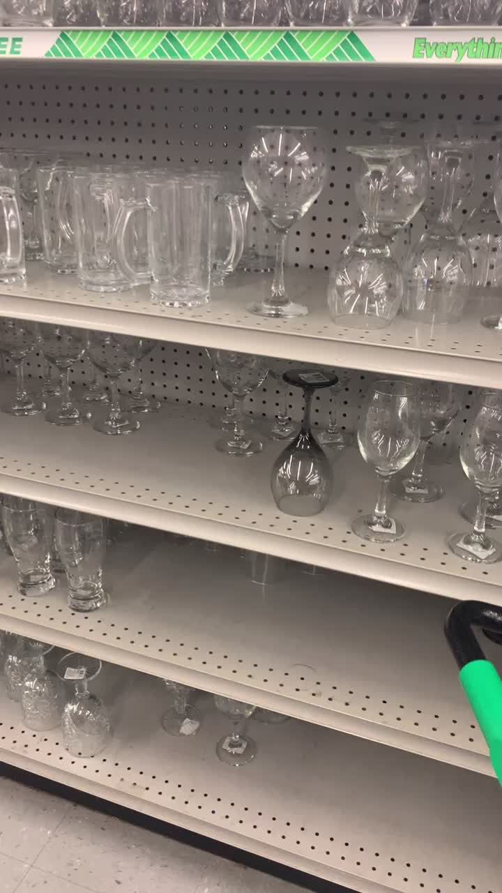 there are many empty glasses on the shelves