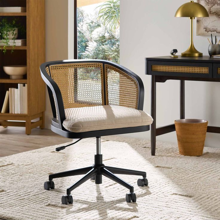 an office chair sitting on top of a rug