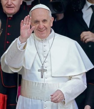 pope benedict waves to the crowd as he arrives for his weekly general audience