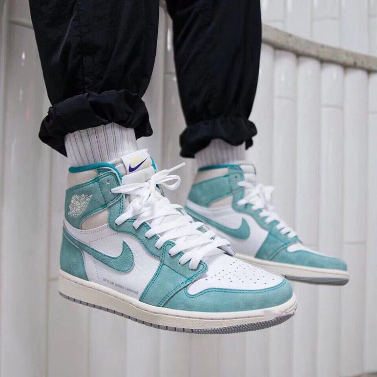 Shift your sneaker collection to another gear and cop the Jordan 1 Retro High Turbo Green. This AJ 1 sports a white upper with green accents, green Nike “Swoosh”, white midsole, and green sole. Jordan 1 Retro High Turbo Green, Jordan 1 Turbo Green, Jordan 1 Outfit, Green Jordans, Turbo Green, Air Jordan 1 Outfit, Nike Casual, Cheap Jordan Shoes, Jordan Outfit