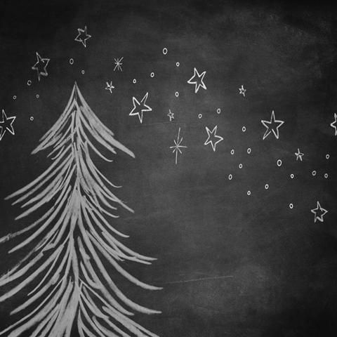 a chalk drawing of a christmas tree on a blackboard with stars and snow flakes